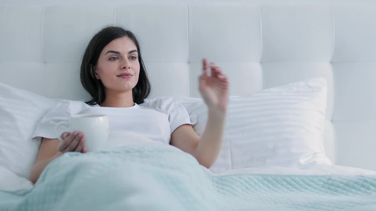 Stock Video Future Woman Using Holographic Web Browser In Bed Live Wallpaper For PC