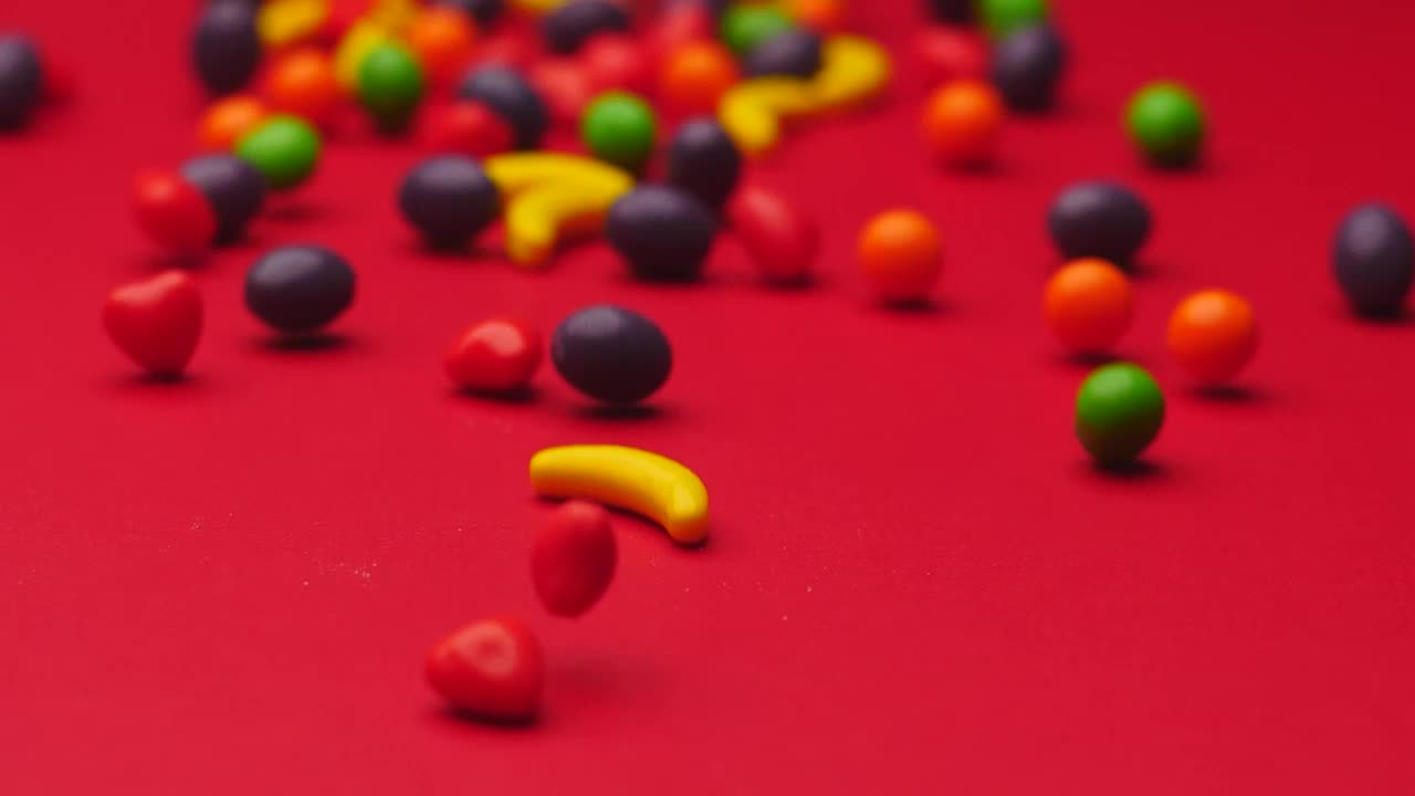 Stock Video Fruit Shaped Candies Sliding On A Surface Live Wallpaper For PC