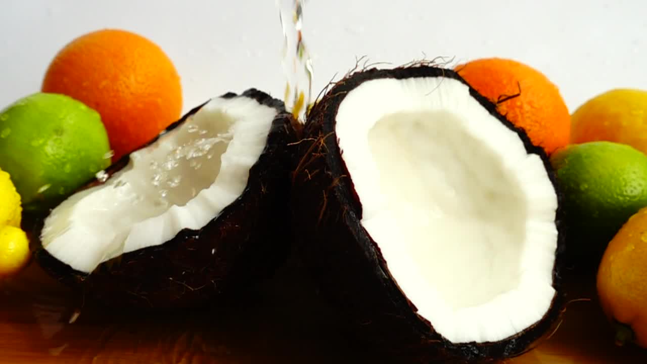 Stock Video Fruit Composition With A Coconut In The Foreground Live Wallpaper For PC