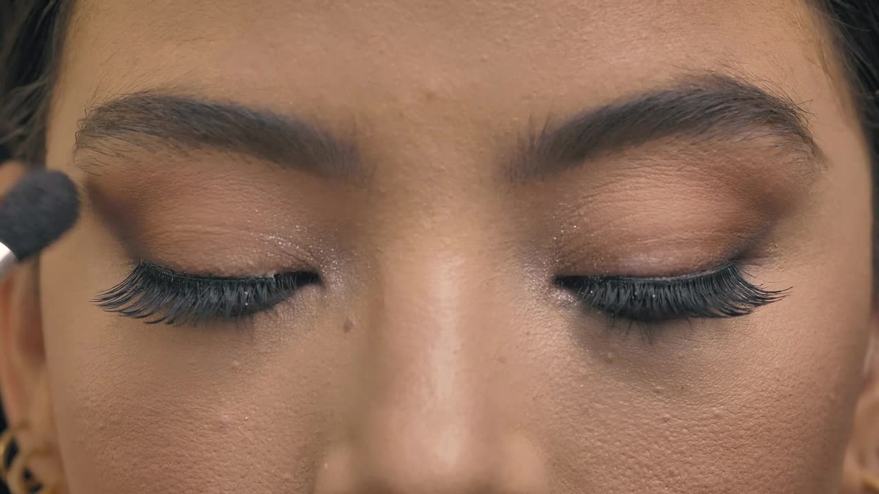 Stock Video Front Look Of A Woman While Being Made Up Live Wallpaper For PC