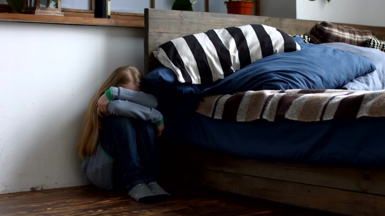 Stock Video Frightened Girl Hiding Beside A Bed Live Wallpaper For PC