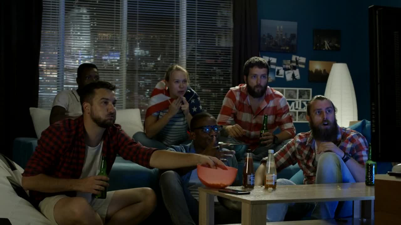 Stock Video Friends Watching A Sports Game At Home Live Wallpaper For PC