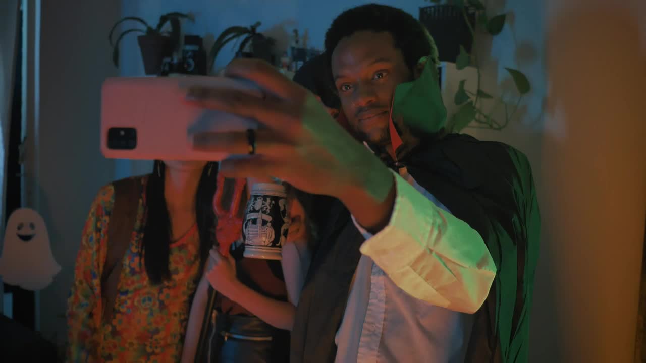 Stock Video Friends Taking A Selfie At A Costume Party Live Wallpaper For PC