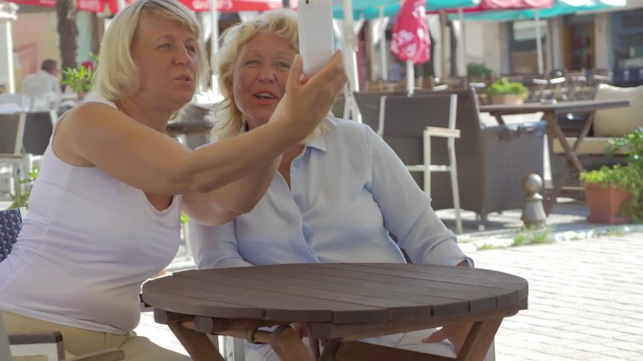 Stock Video Friends Taking A Photo During An Afternoon Out Live Wallpaper For PC