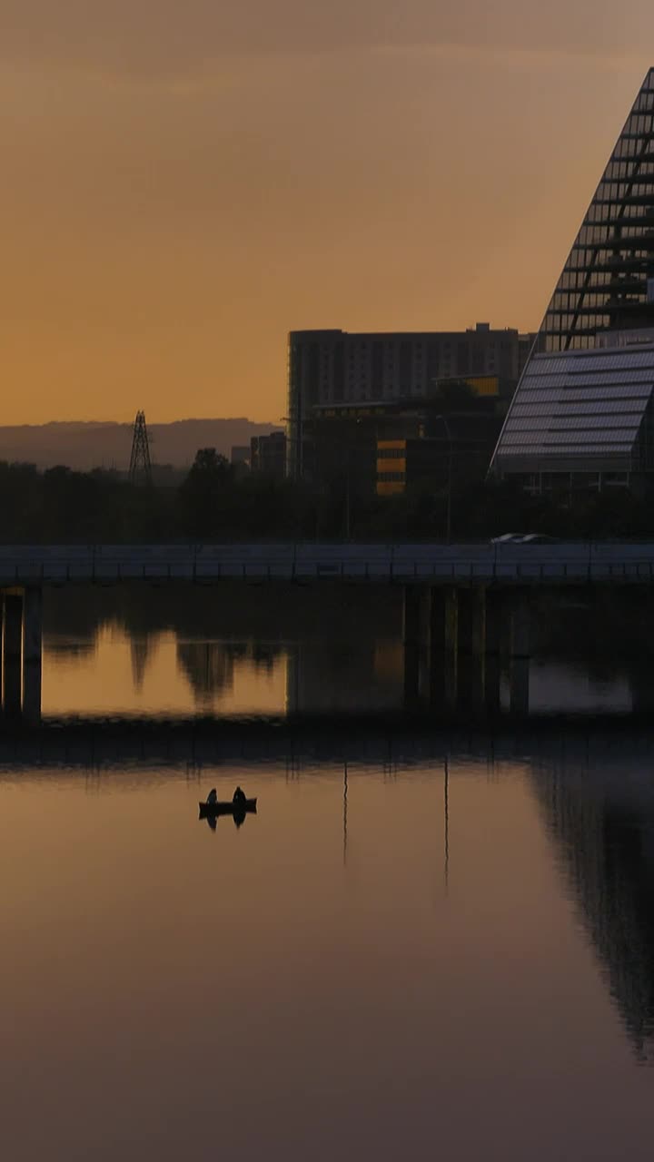 Stock Video Lake On The Outskirts Of A Big City At Sunset Animated Wallpaper