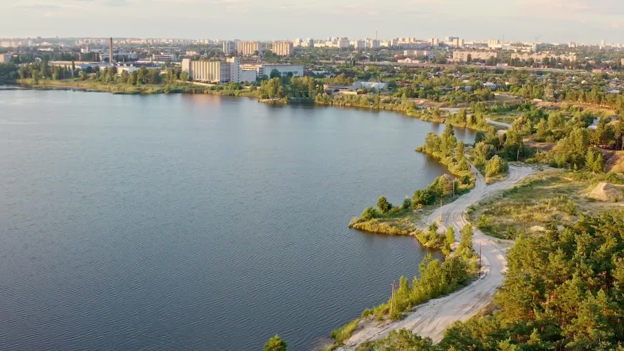 Stock Video Lake Near A City Aerial View Animated Wallpaper