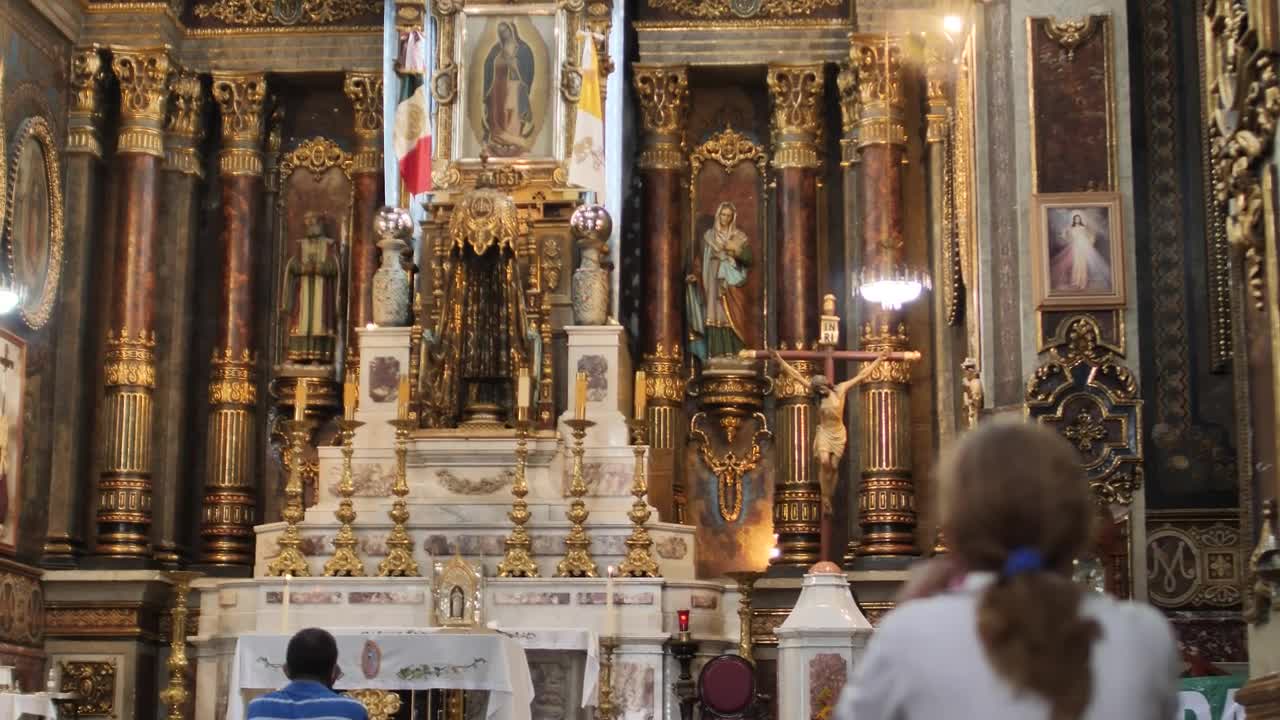 Stock Video Lady Praying In Front Of A Large Altar Inside A Animated Wallpaper