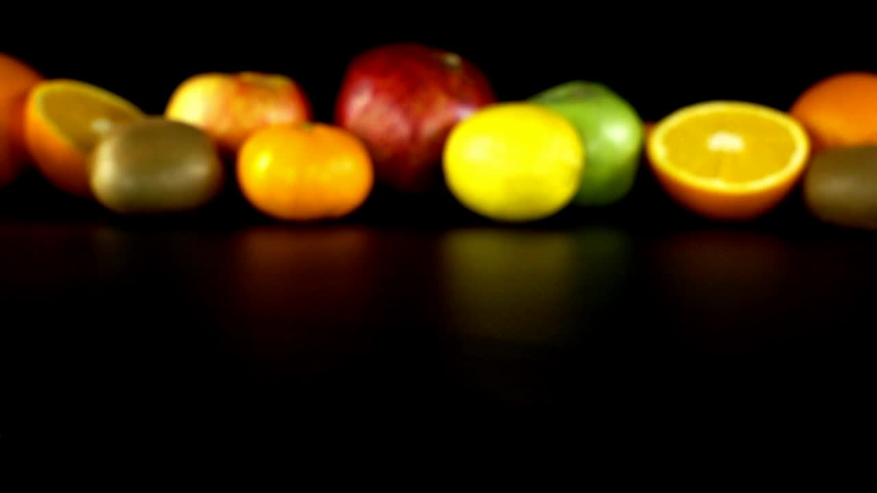 Stock Video Kiwi Halved Close To More Fruit Animated Wallpaper