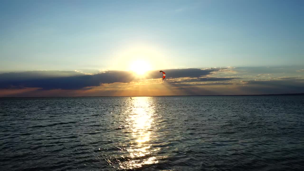 Stock Video Kite Boarding At Sunset Animated Wallpaper