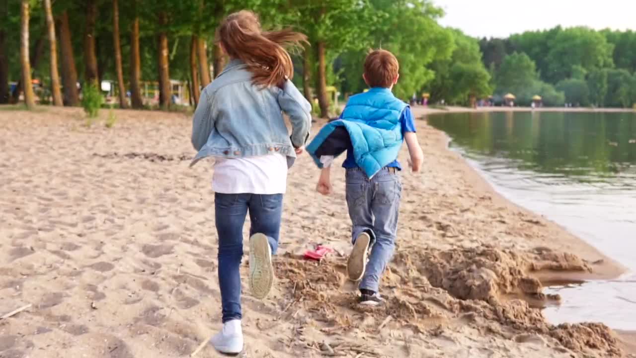 Stock Video Kids Running By A Lake Animated Wallpaper
