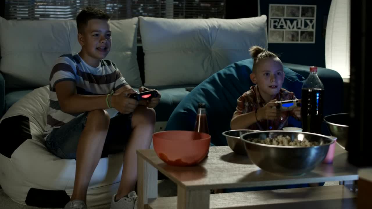 Stock Video Kids Playing Video Games In The Living Room Animated Wallpaper
