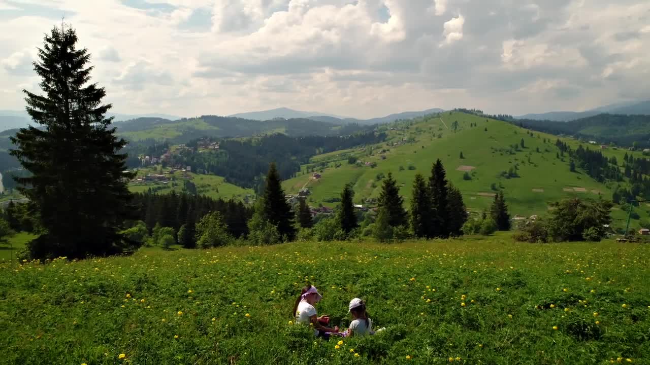 Stock Video Kids Playing At A Green Hill Animated Wallpaper