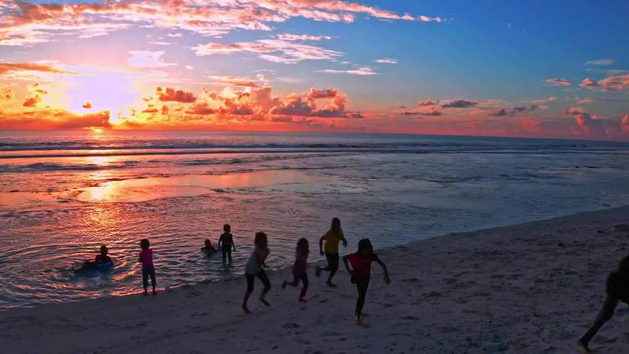 Stock Video Kids Having Fun On The Beach Animated Wallpaper