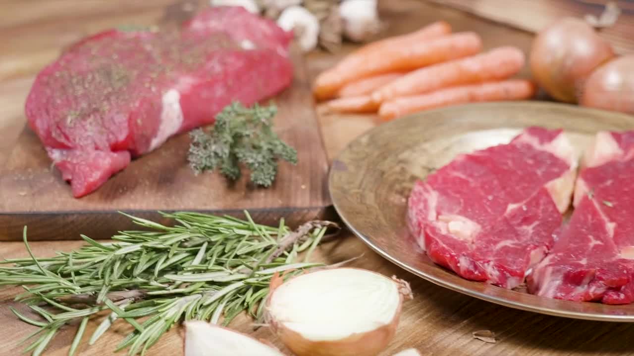 Stock Video Keto Diet Raw Steak Display On Rustic Table Animated Wallpaper