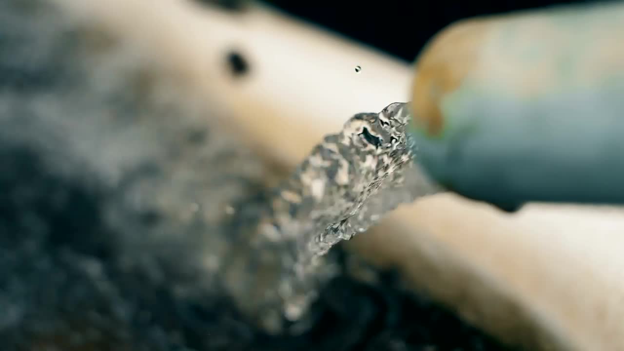 Stock Video Jet Water Is Poured Into The Hands Of A Person Animated Wallpaper