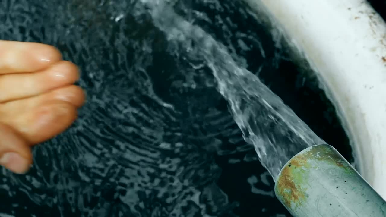 Stock Video Jet Of Water Falling In A Hand Animated Wallpaper