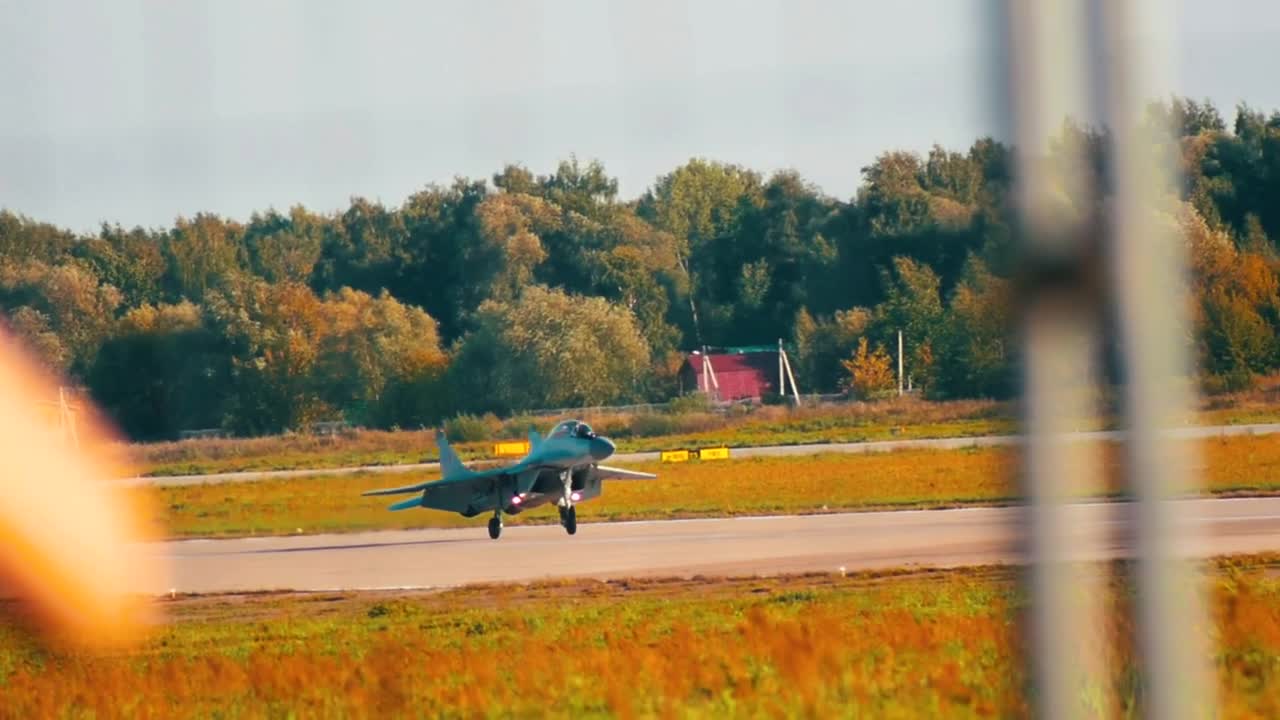 Stock Video Jet Moving In The Distance Down A Runway Animated Wallpaper