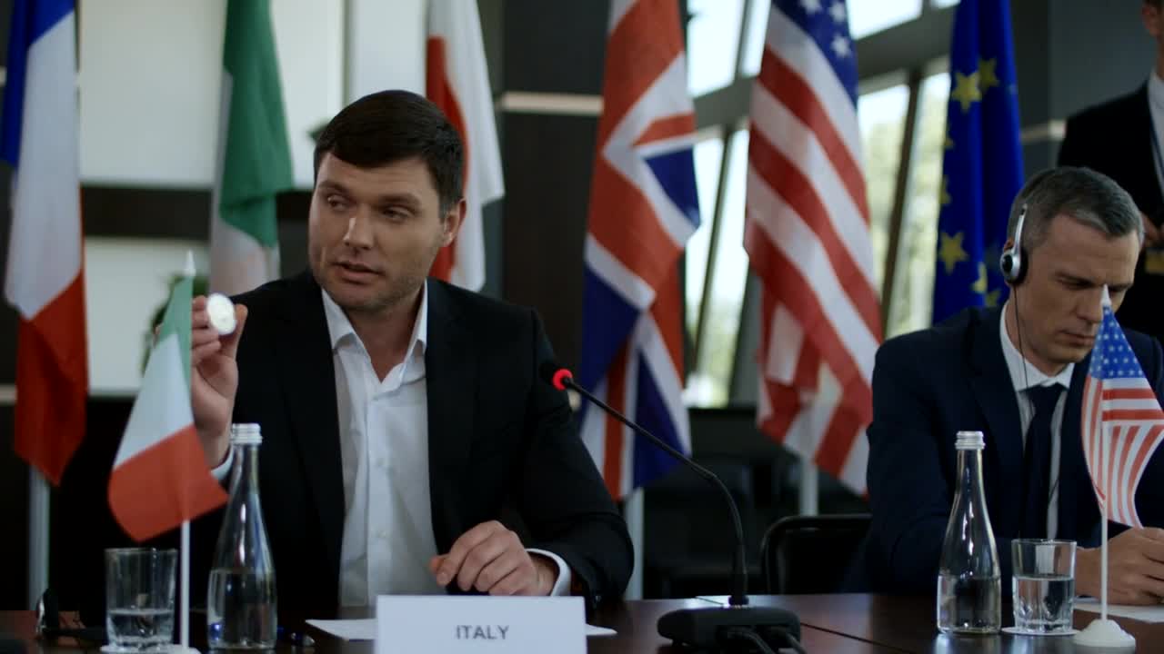 Stock Video Italian Politic Man Showing Bitcoin In Conference Animated Wallpaper