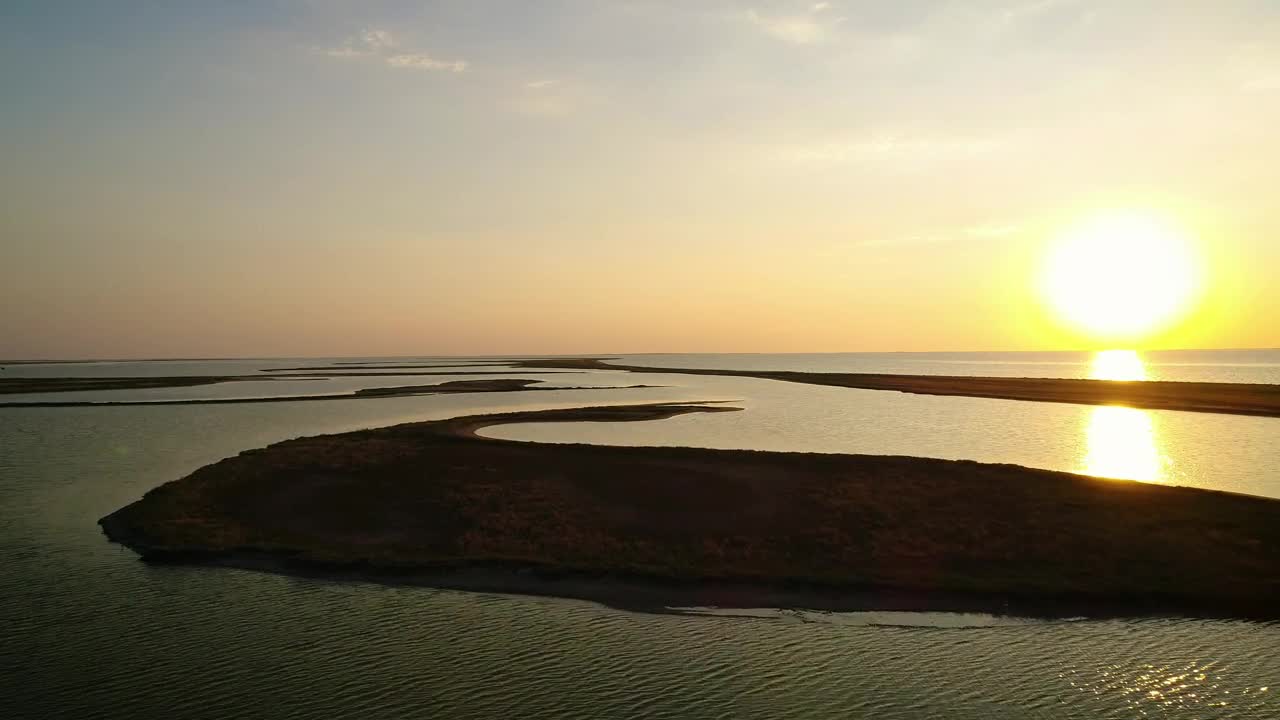 Stock Video Irregular Landforms In The Sea During Sunset Animated Wallpaper