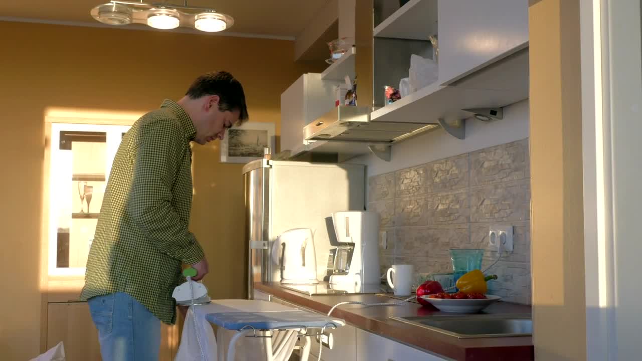 Stock Video Ironing Work Clothes Animated Wallpaper