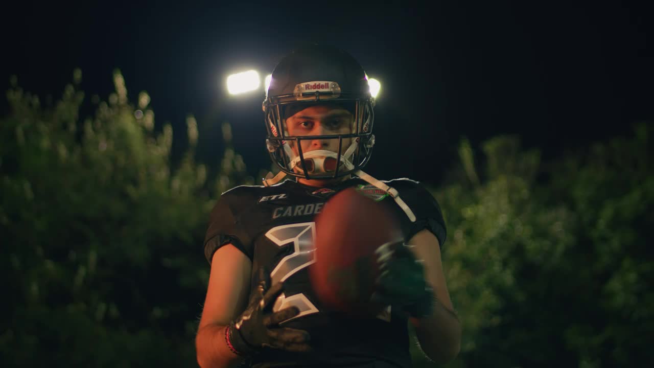 Stock Video Intimidating Football Player In Front Of The Camera Animated Wallpaper