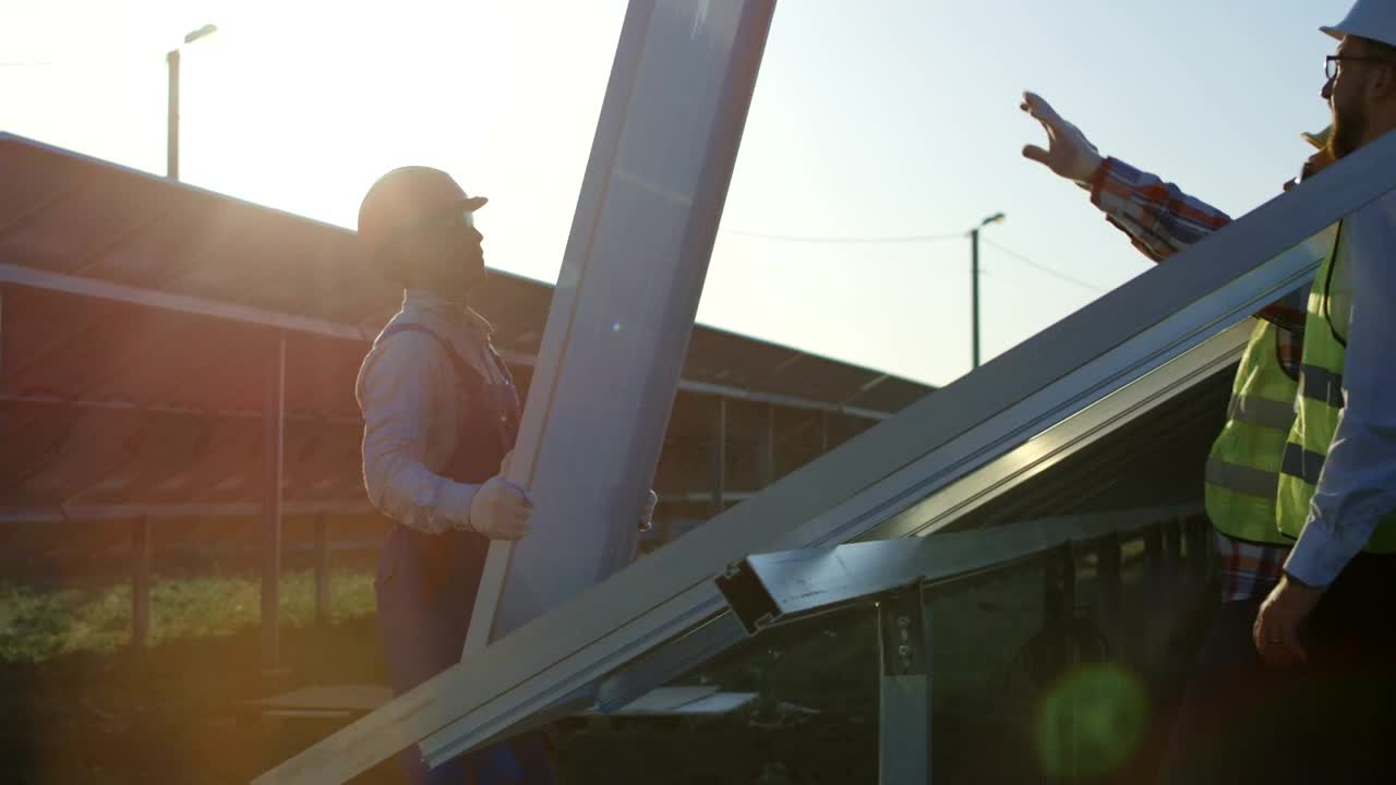 Stock Video Installing A Solar Panel In The Field Animated Wallpaper