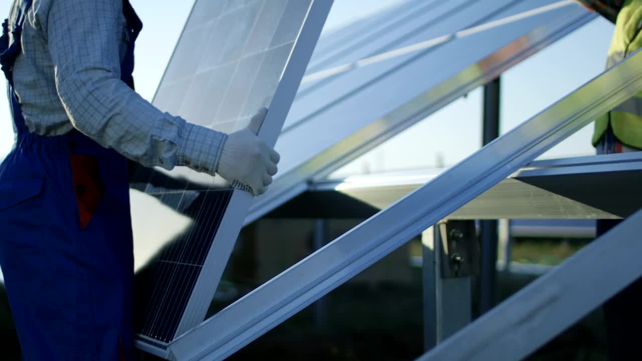Stock Video Installing A Solar Panel Close Up Animated Wallpaper