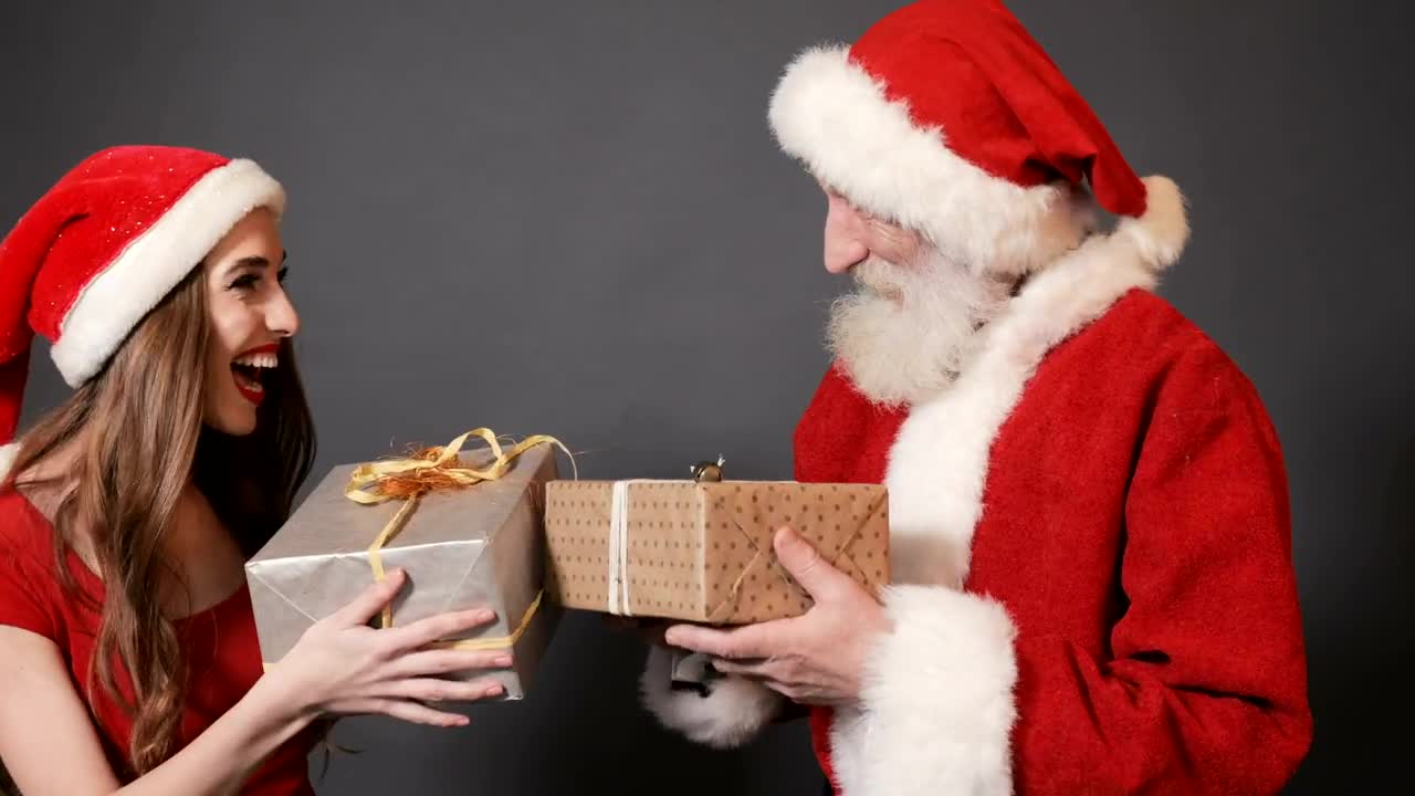 Stock Video Instagram Photoshoot Santa Claus And His Female Helper Animated Wallpaper