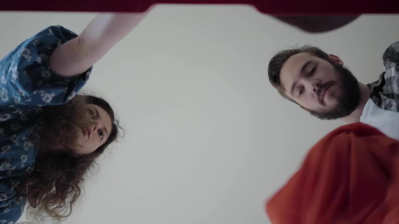 Stock Video Inside Luggage View Of Couple Packing For Trip Animated Wallpaper