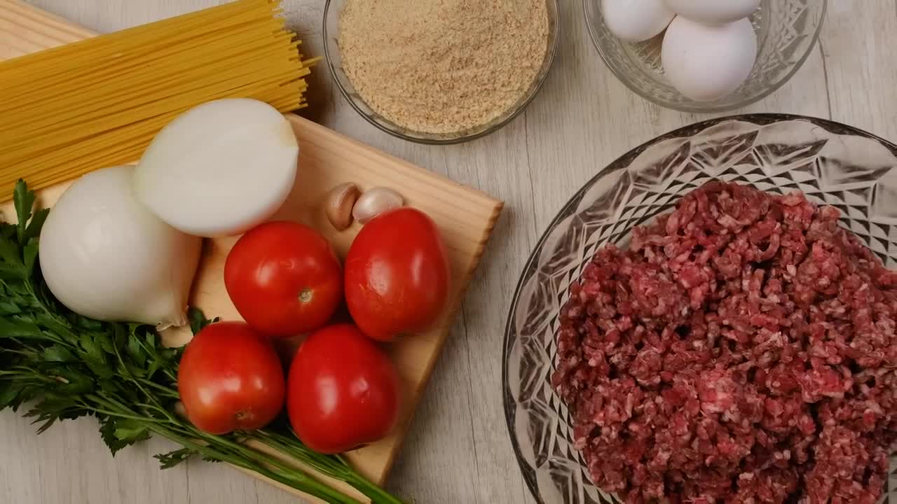 Stock Video Ingredients For Preparing Meat Balls Animated Wallpaper