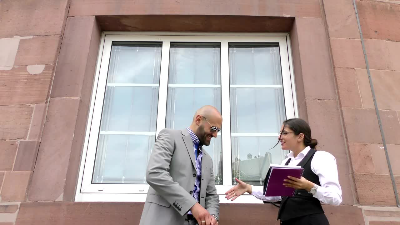 Stock Video Informal Business Meeting In The Street Animated Wallpaper