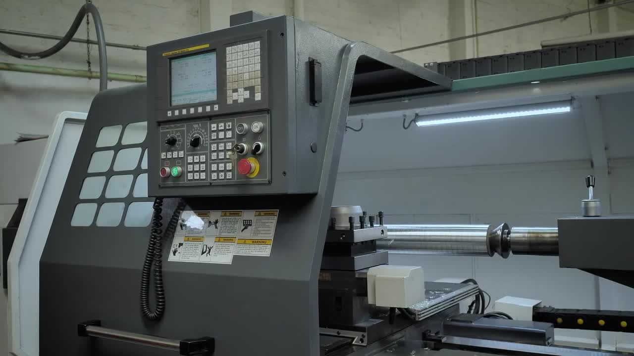 Stock Video Industrial Cutter And Its Control Panel Animated Wallpaper