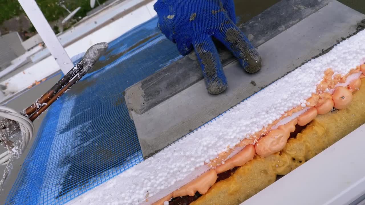 Stock Video Industrial Climber Working On A Wall Of A Building Animated Wallpaper