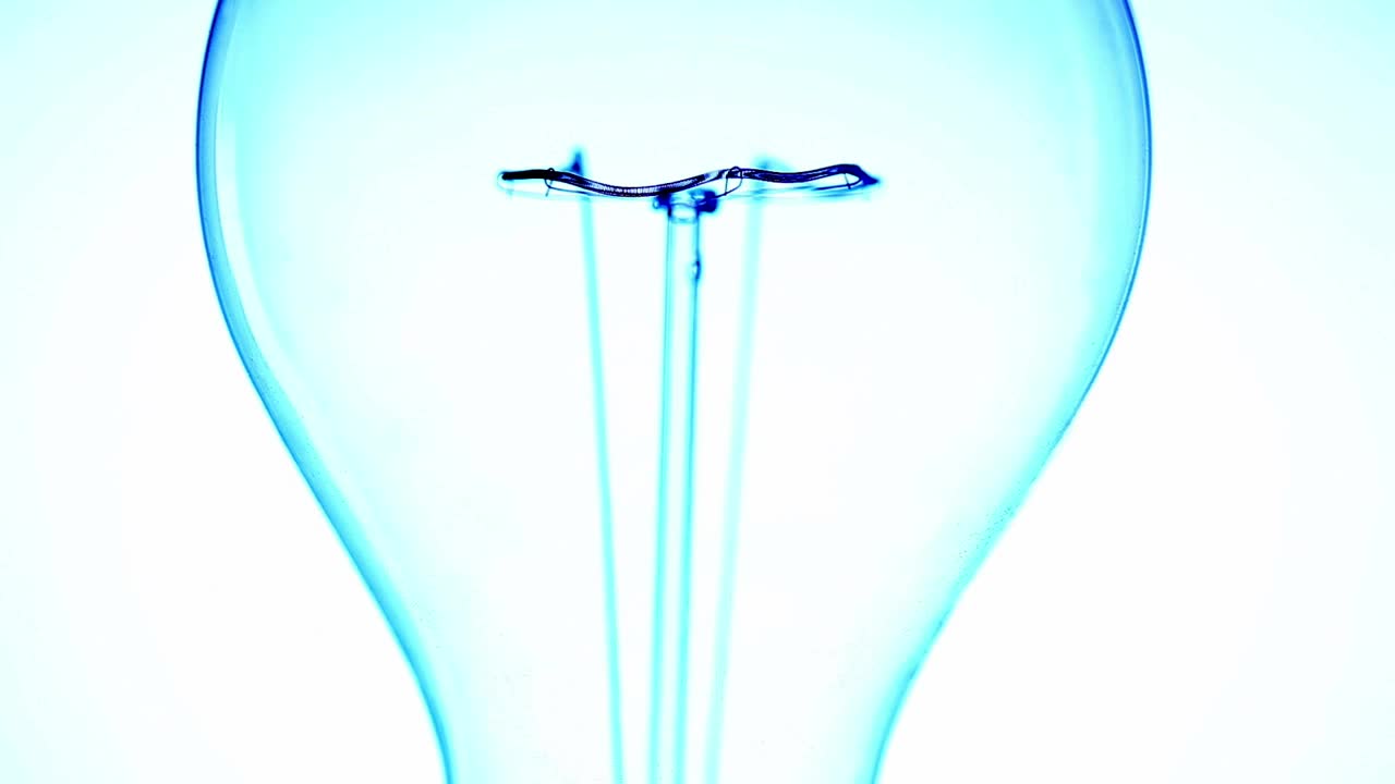 Stock Video Incandescent Light Bulb Turning On Animated Wallpaper