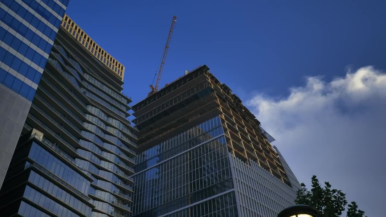 Stock Video Immense And Modern Building Under Construction Animated Wallpaper