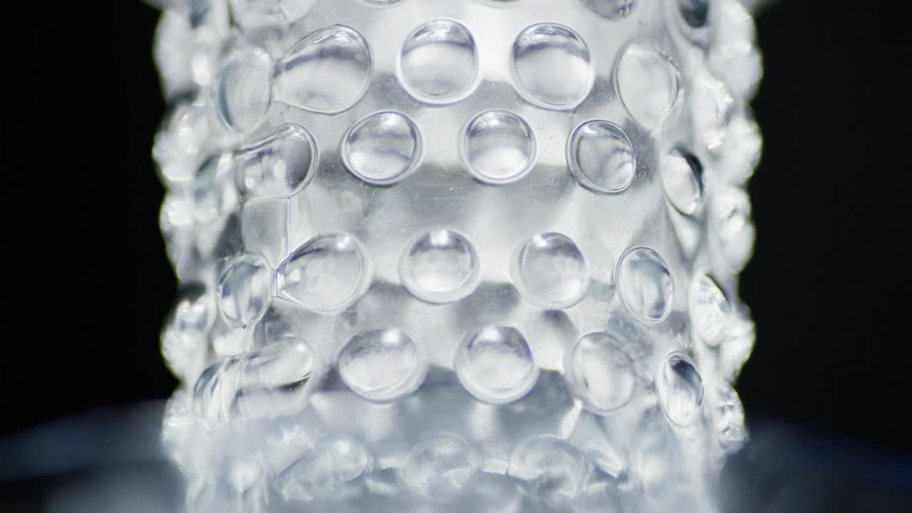 Stock Video Ice Spheres Rotating On A Black Background Animated Wallpaper