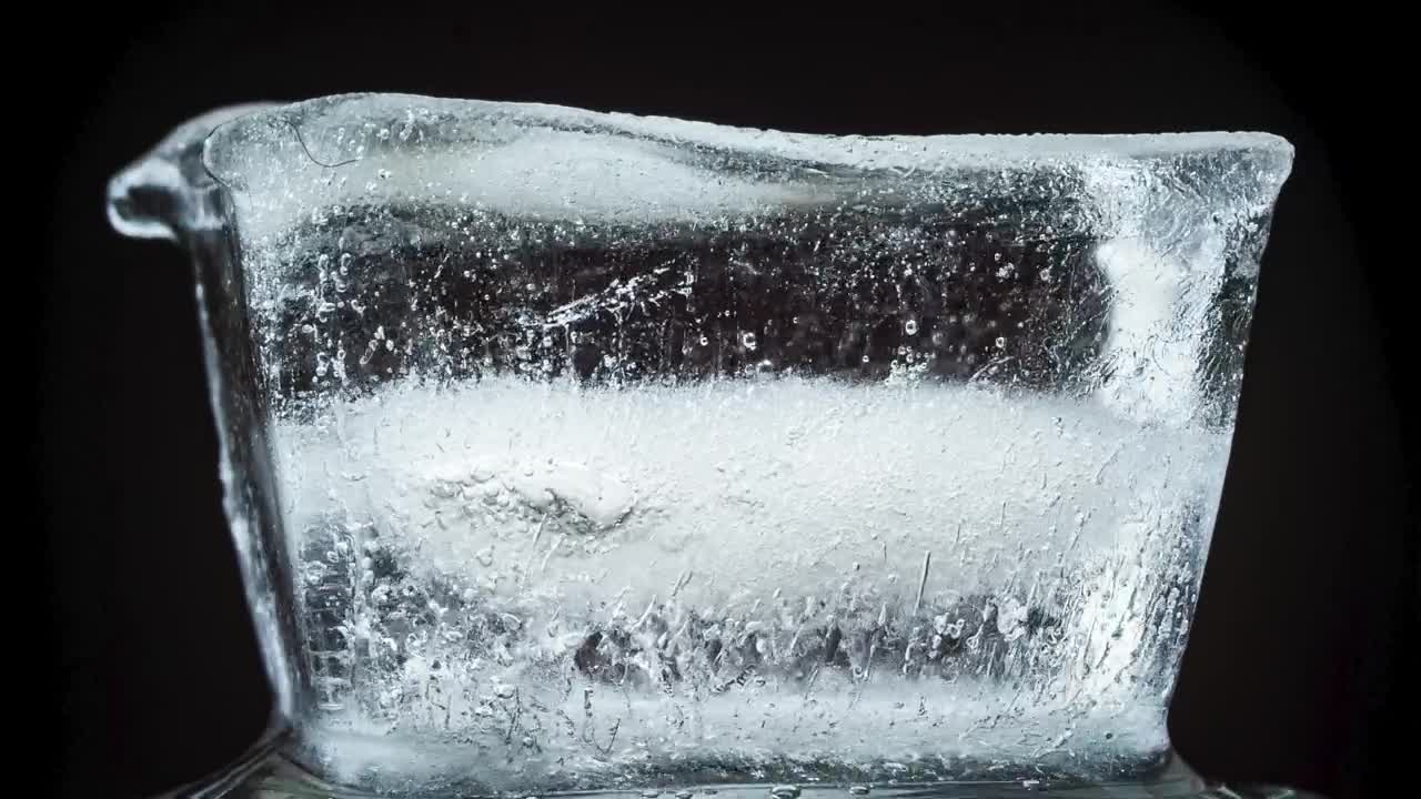 Stock Video Ice Melting On A Black Background Time Lapse Animated Wallpaper