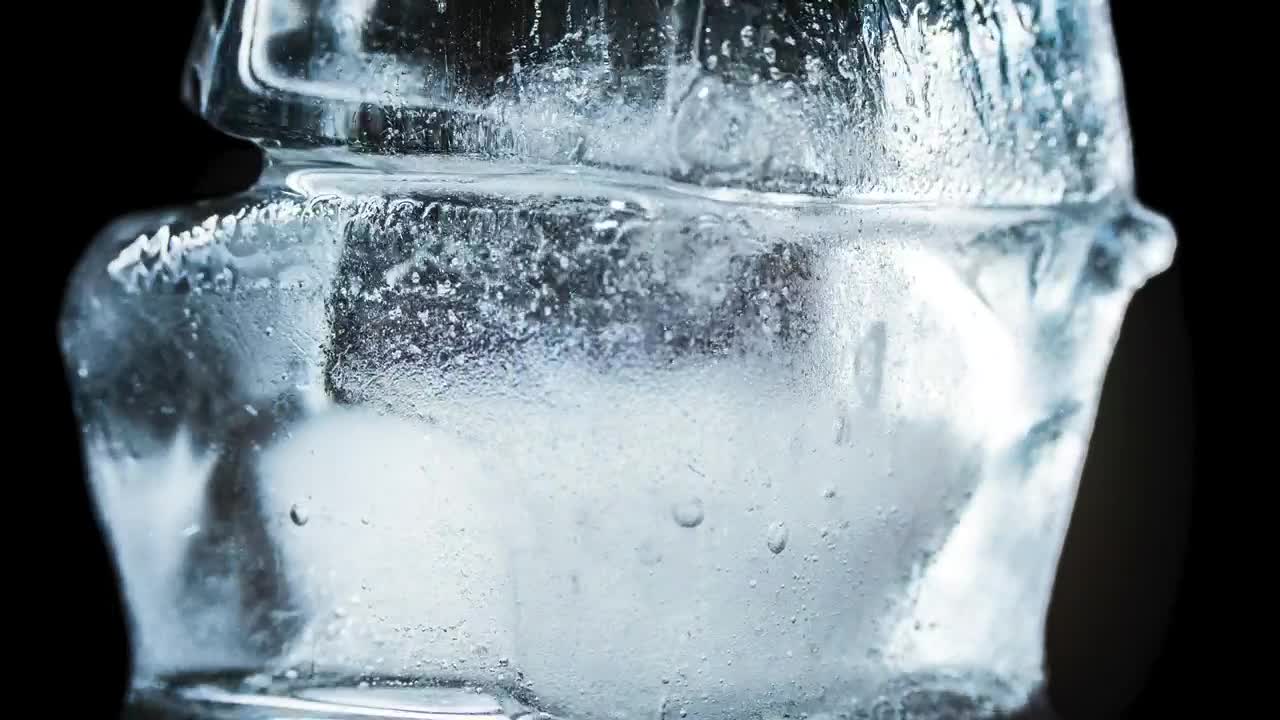 Stock Video Ice Cubes Thawing On Black Background Animated Wallpaper