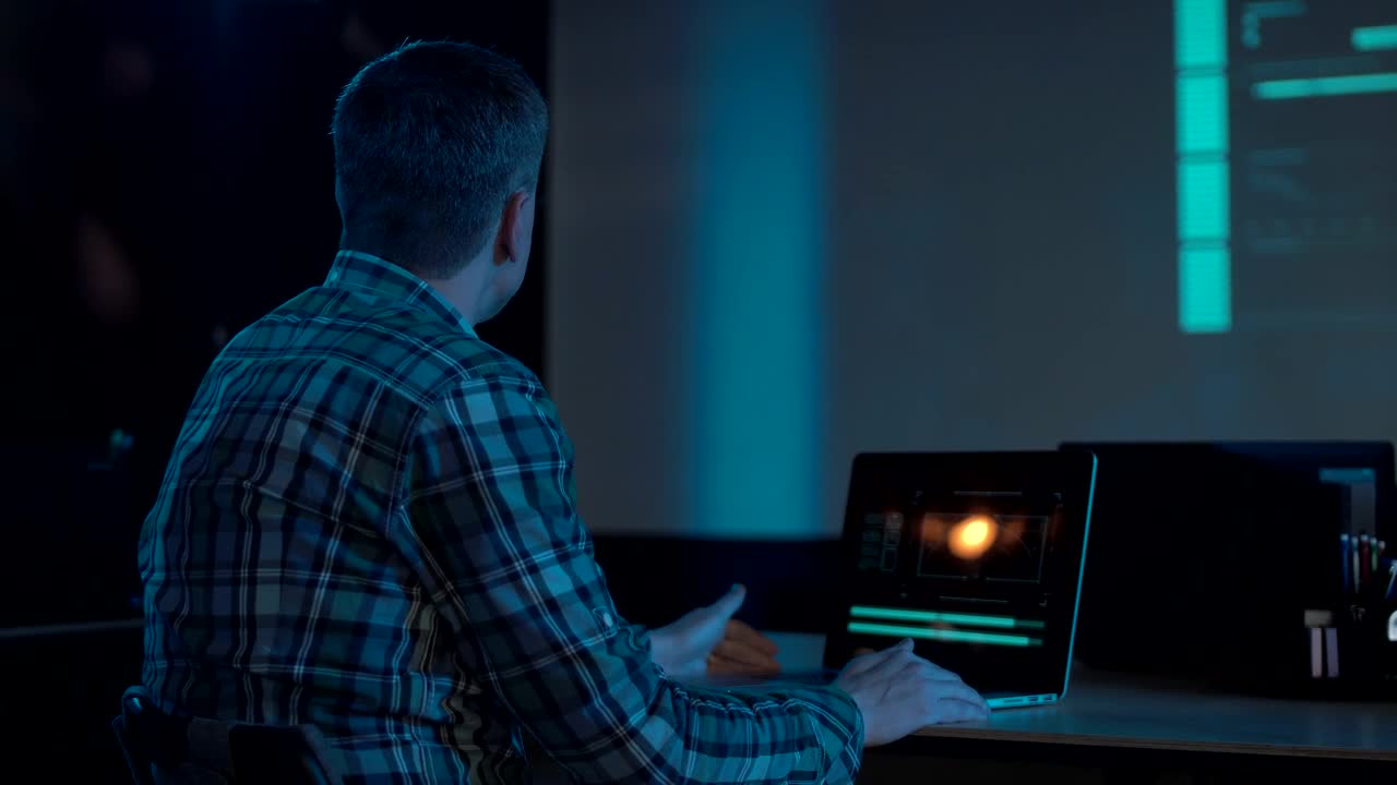 Stock Video I Am Working With Laptop In The Office At Night Animated Wallpaper