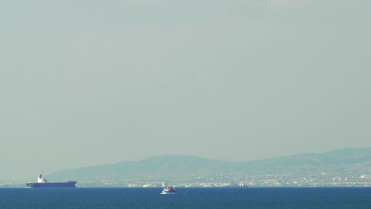 Stock Video Huge Ship Arriving At A Coastal City Animated Wallpaper
