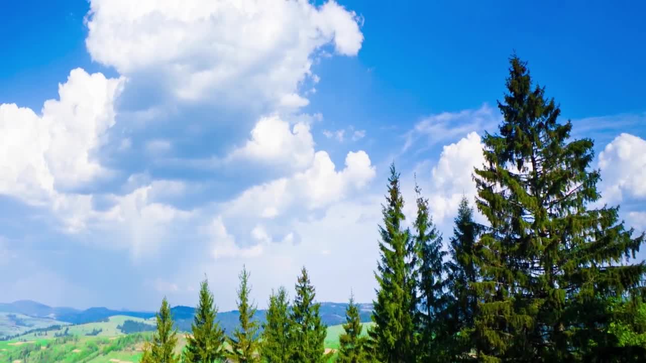Stock Video Huge Clouds In The Blue Sky On The Meadow Animated Wallpaper