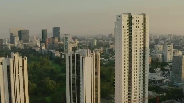 Stock Video Huge City With A Large Park In An Aerial Shot Smal Animated Wallpaper