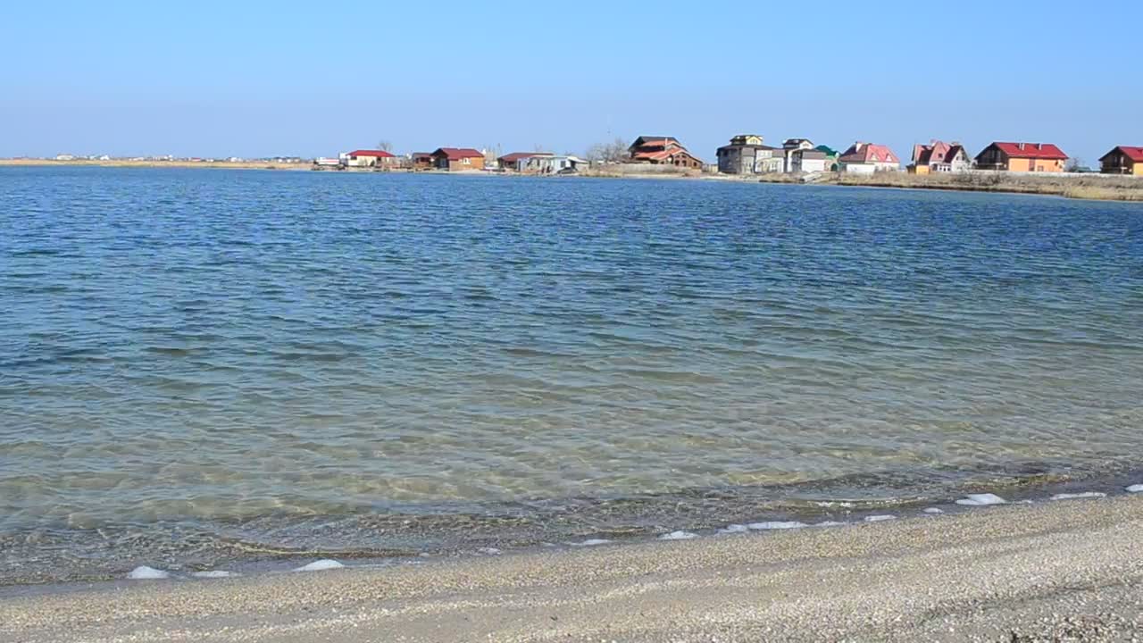 Stock Video Houses Next To The Sea Animated Wallpaper