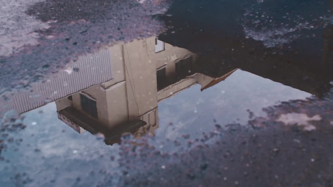 Stock Video House Reflected In A Puddle Animated Wallpaper