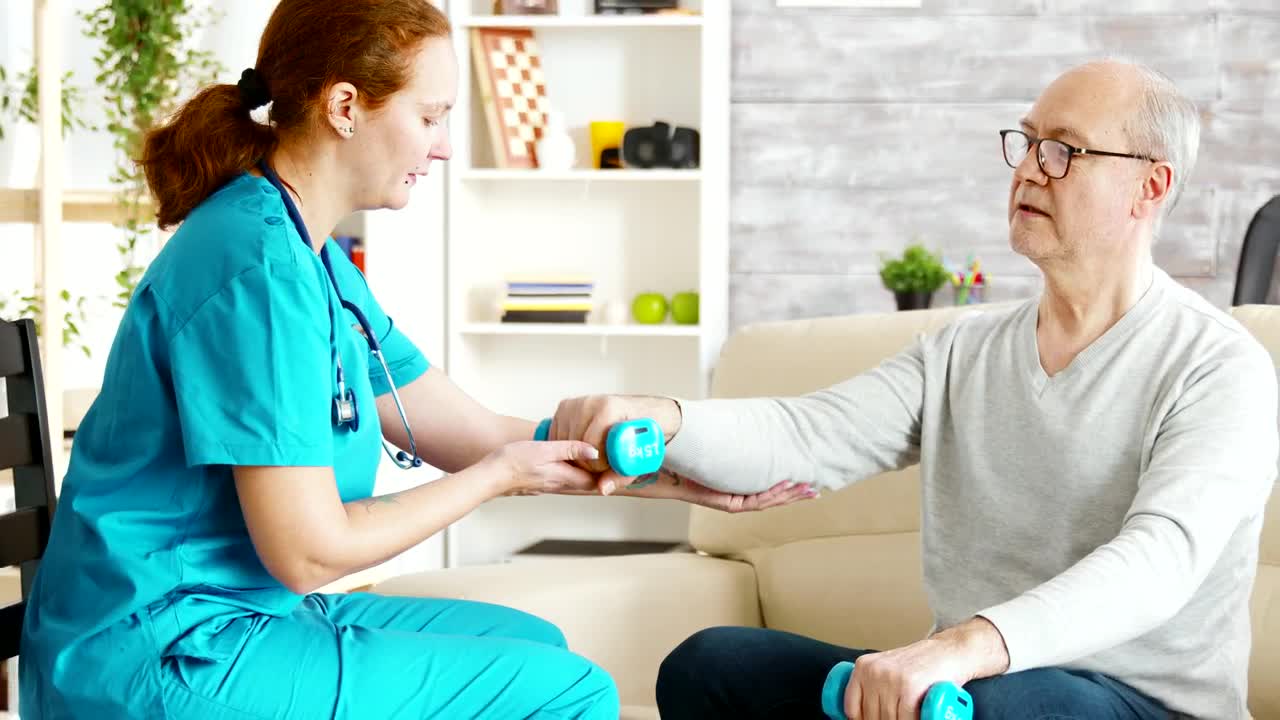Stock Video Hospital Nurse Helping Man With Physical Therapy Animated Wallpaper