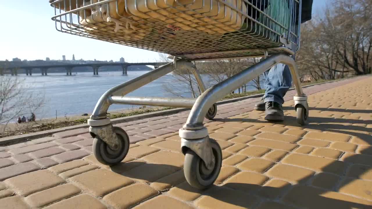 Stock Video Homeless Man With A Cart Animated Wallpaper