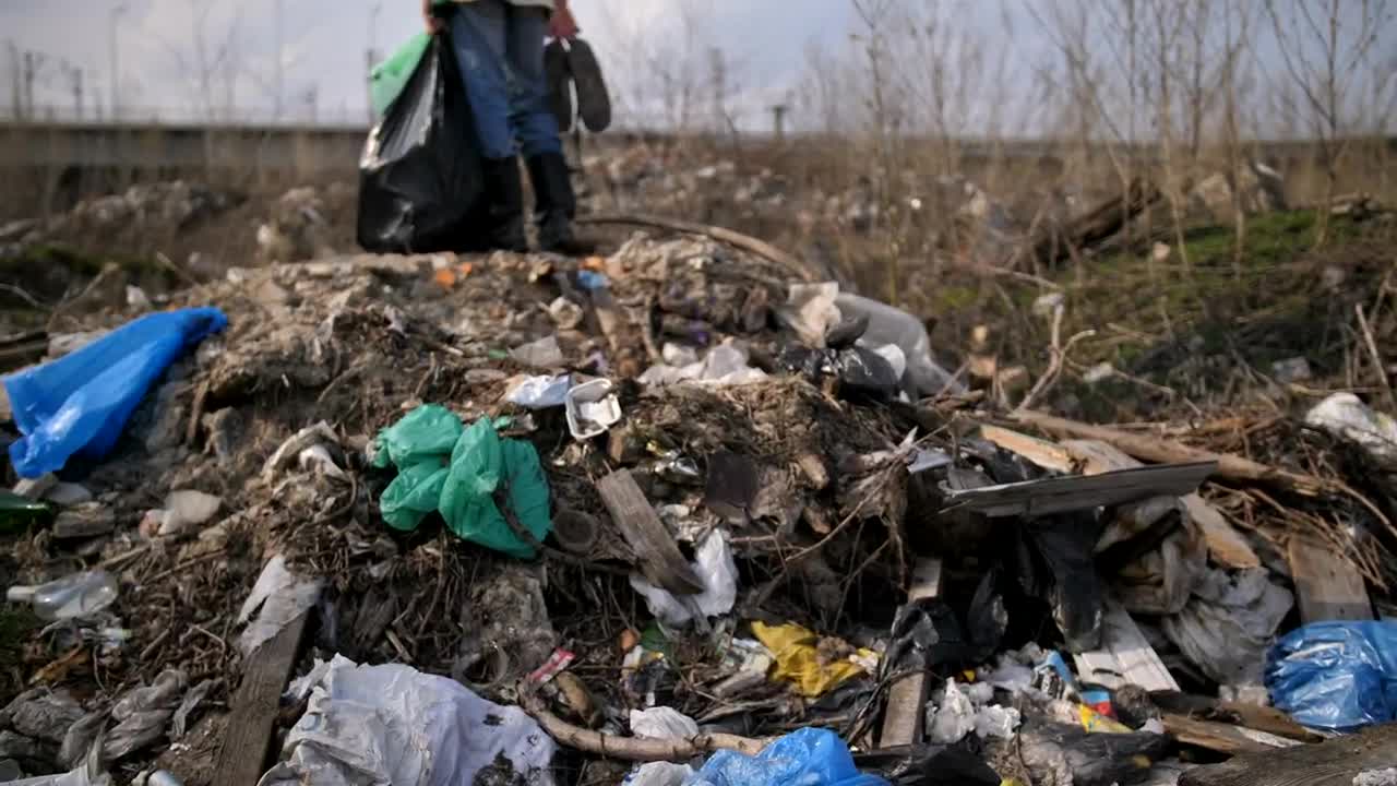 Stock Video Homeless Man Standing On A Pile Of Rubbish Animated Wallpaper