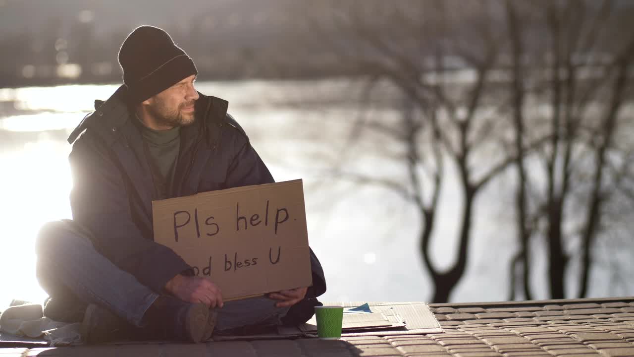 Stock Video Homeless Man Putting Away Money Animated Wallpaper