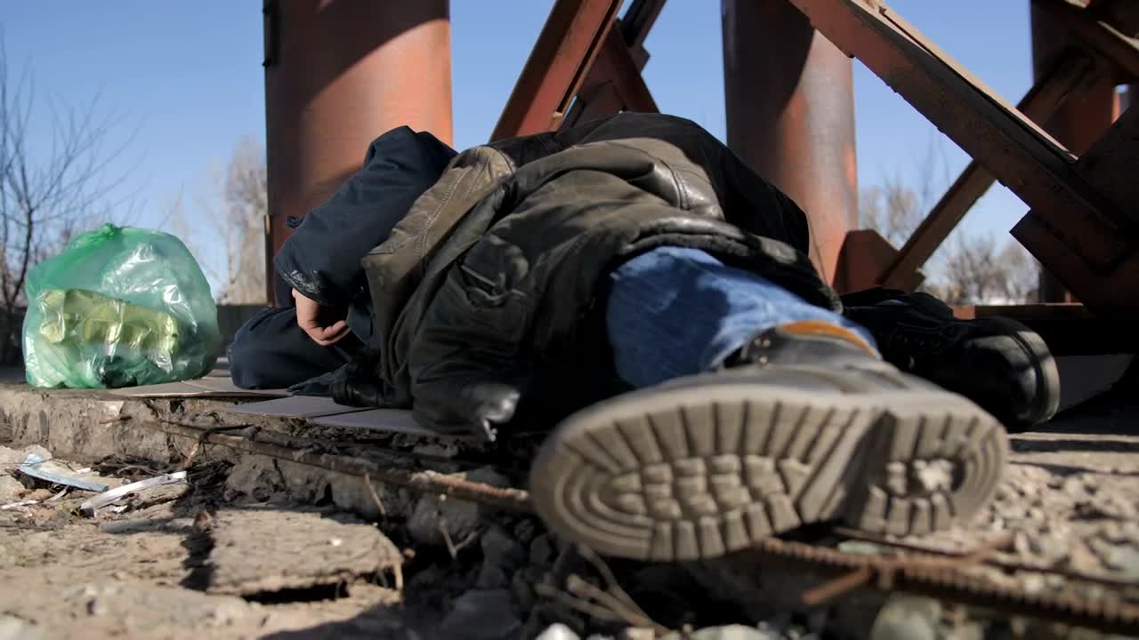 Stock Video Homeless Man Laying Down Animated Wallpaper