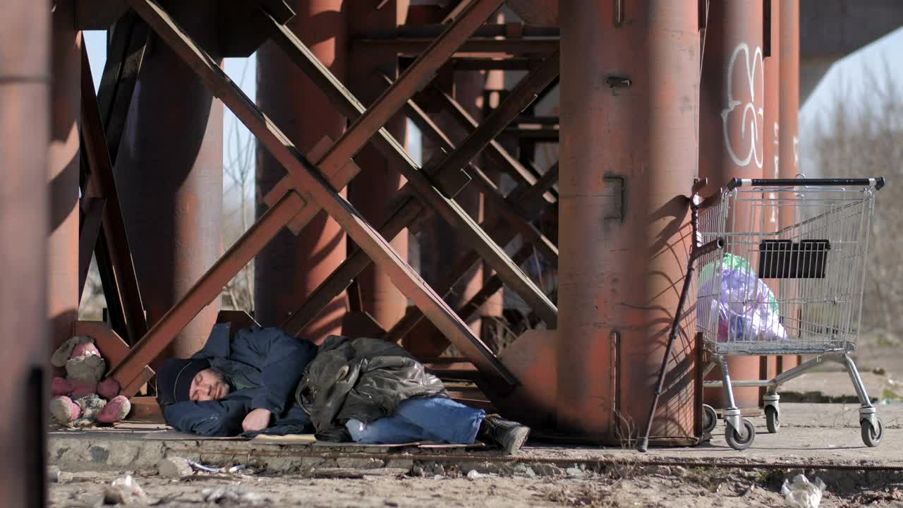 Stock Video Homeless Man Covering Himself Animated Wallpaper